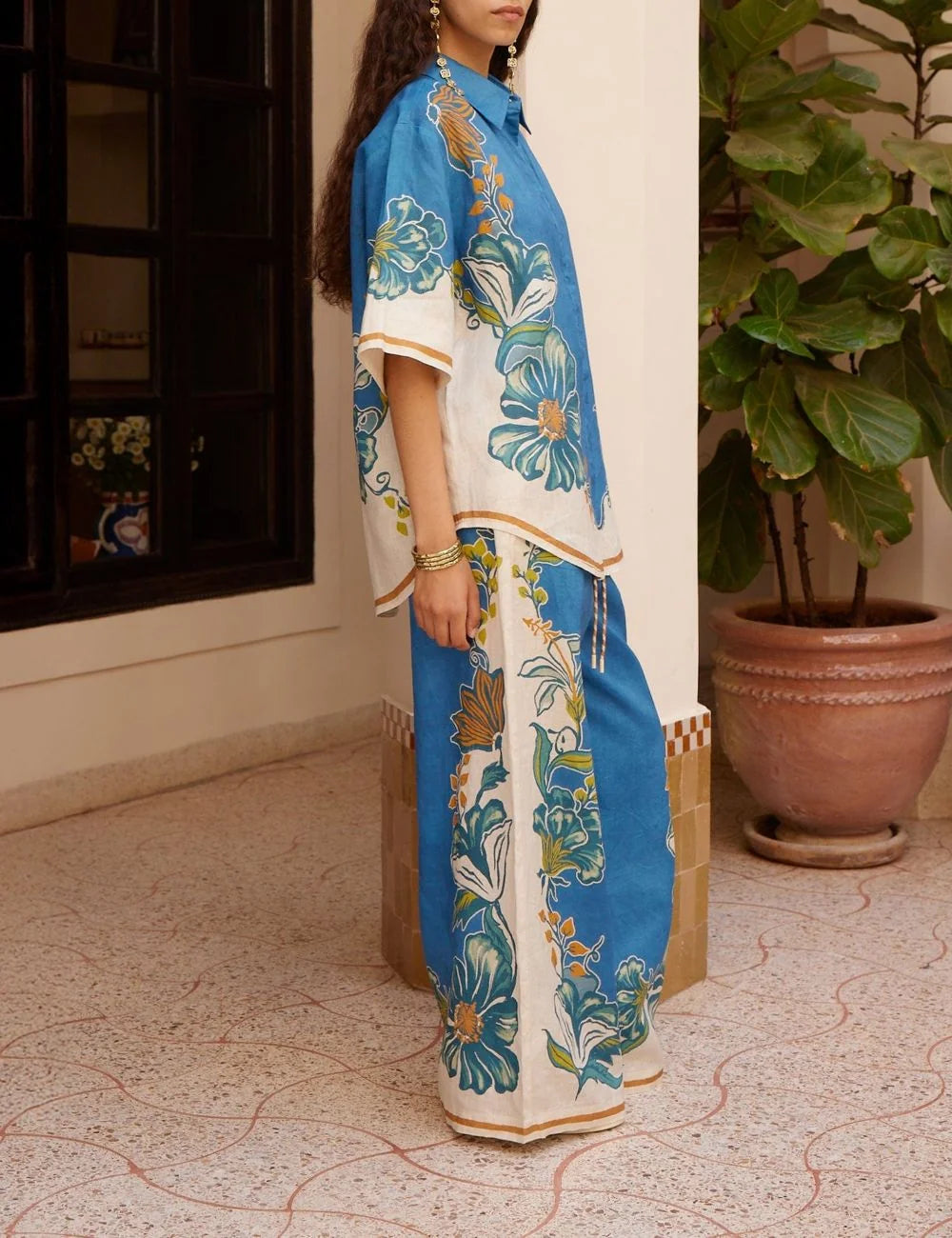 Alemais Luda shirt side view blue floral resort style