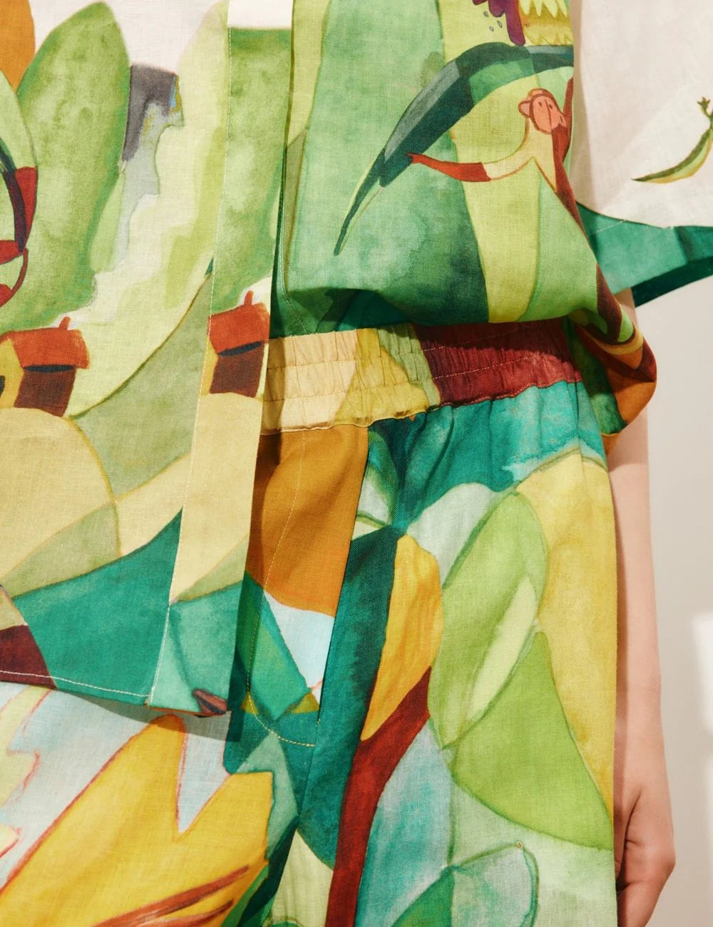 Alemais Mokshini wide leg pants colorful tropical print detail view