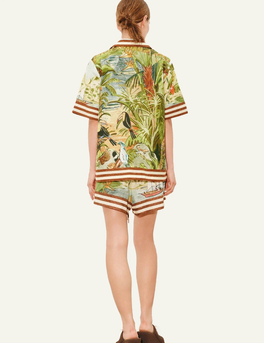 Alemais Toucan Tango poukamiso linen tropical print light blue back model view