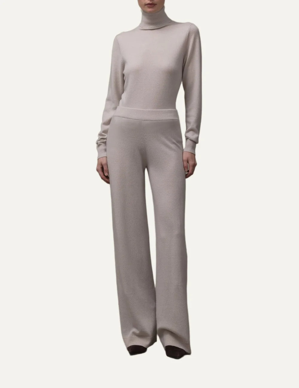 Allude women's beige wool and cashmere knit trousers with wide straight legs, elasticated ribbed waistband and ribbed hems full body