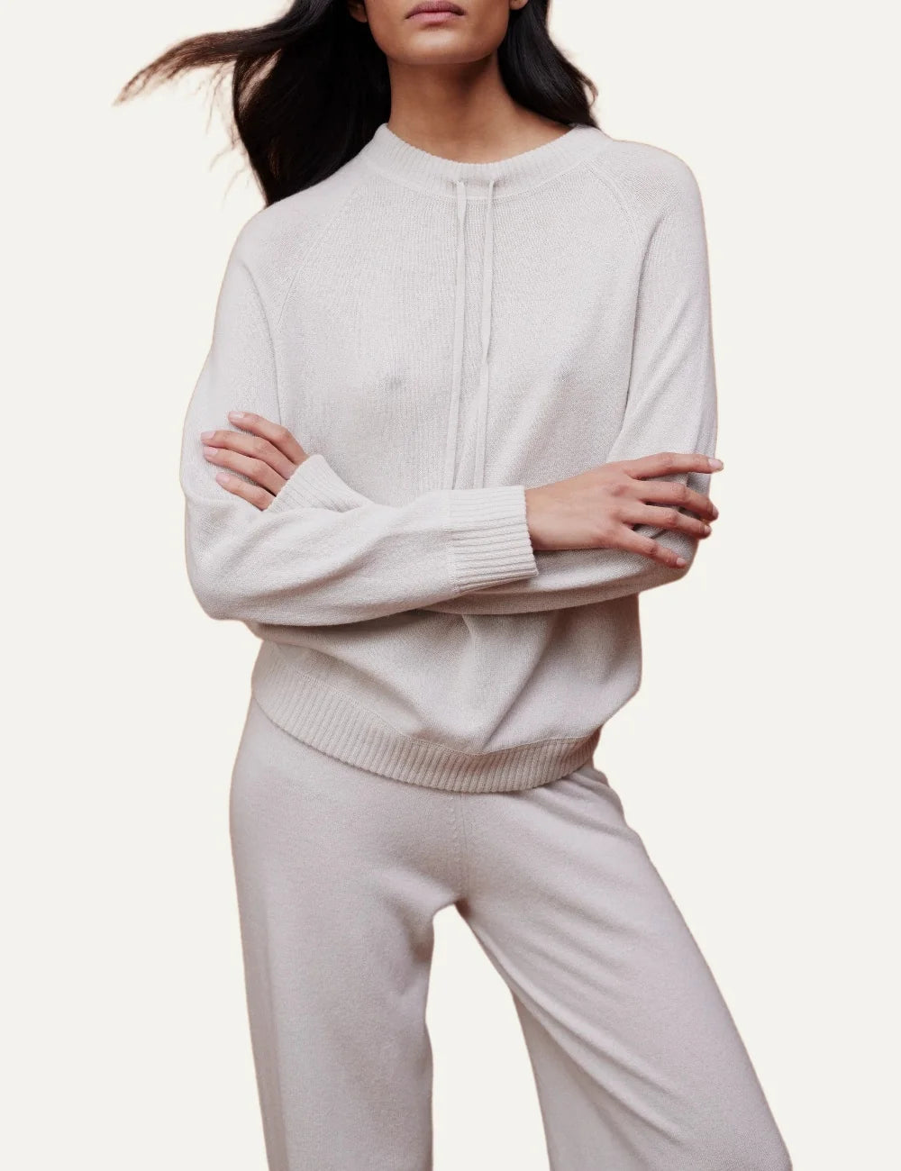 Allude women's beige wool and cashmere knit trousers with wide straight legs, elasticated ribbed waistband and ribbed hems model