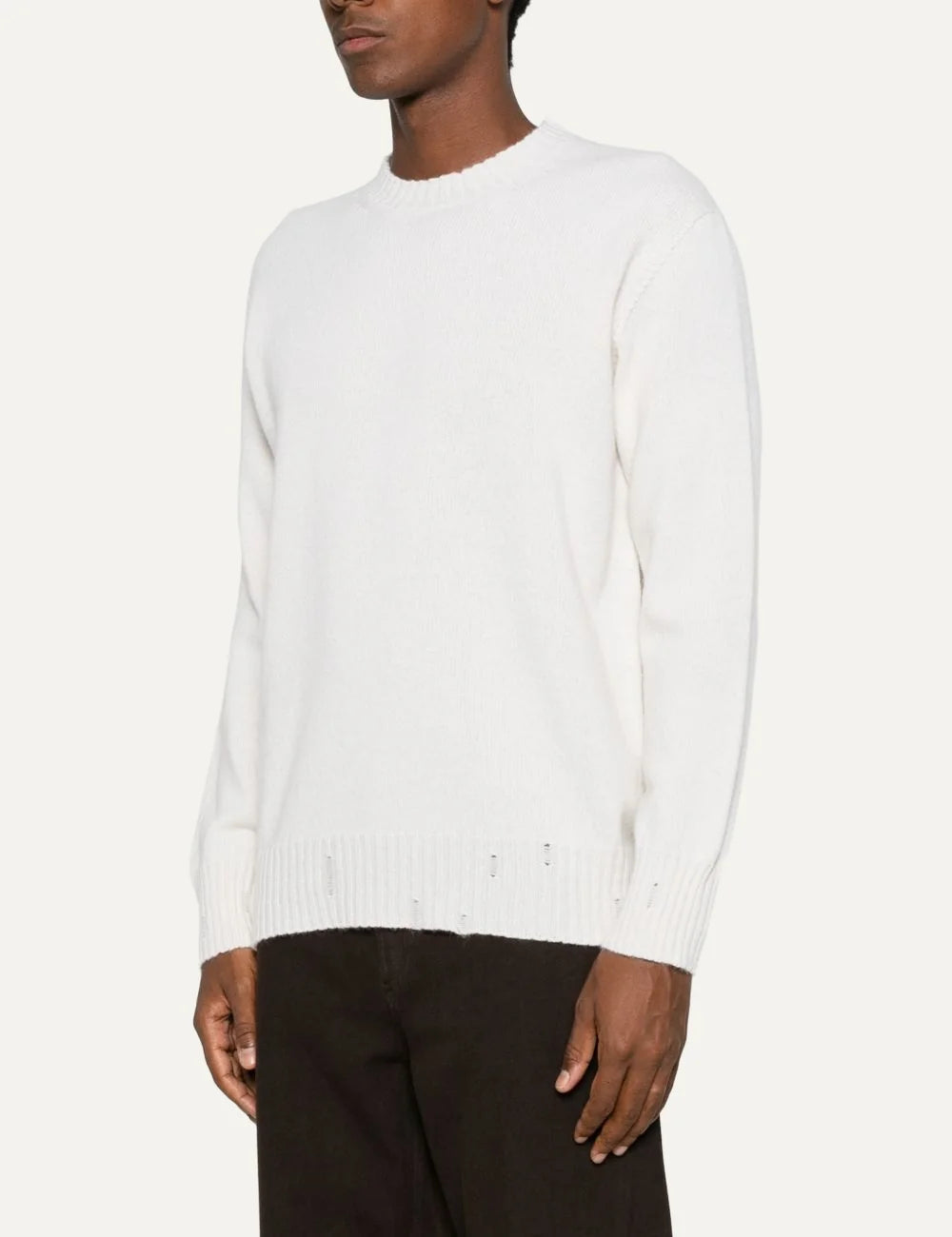 Men's Amaranto cream white wool and cashmere crew neck sweater with subtle distressed details and ribbed cuffs, side view