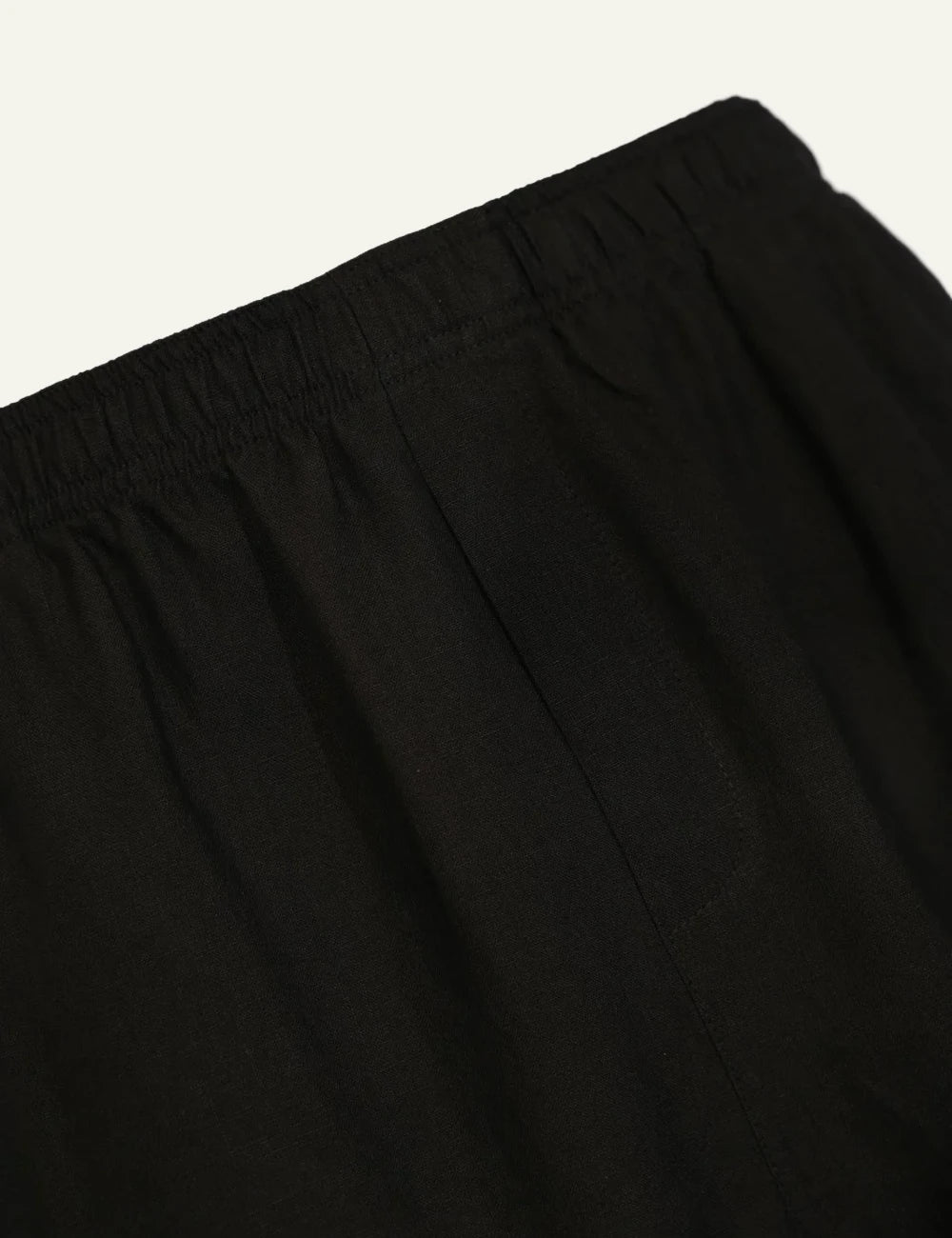 Amaranto black linen shorts front detail view