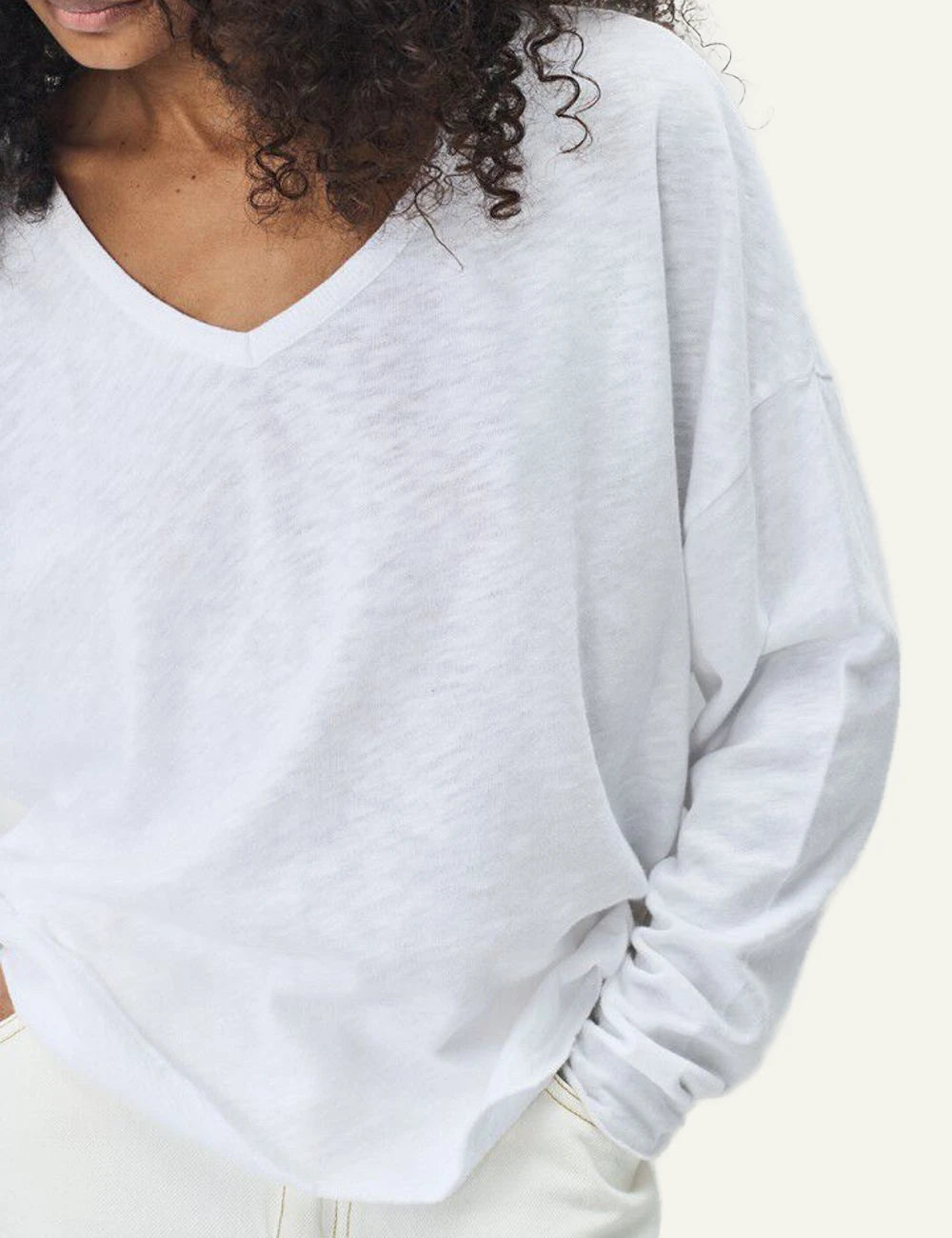 american vintage long sleeve top white v-neck relaxed front detail view