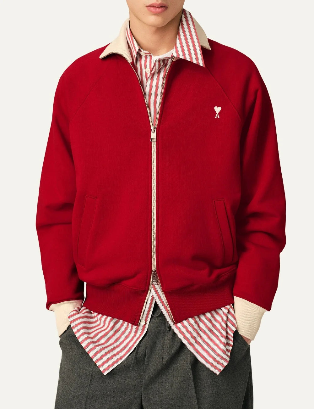 AMI Paris men red organic cotton zip sweatshirt with ecru collar and Ami de Coeur logo model