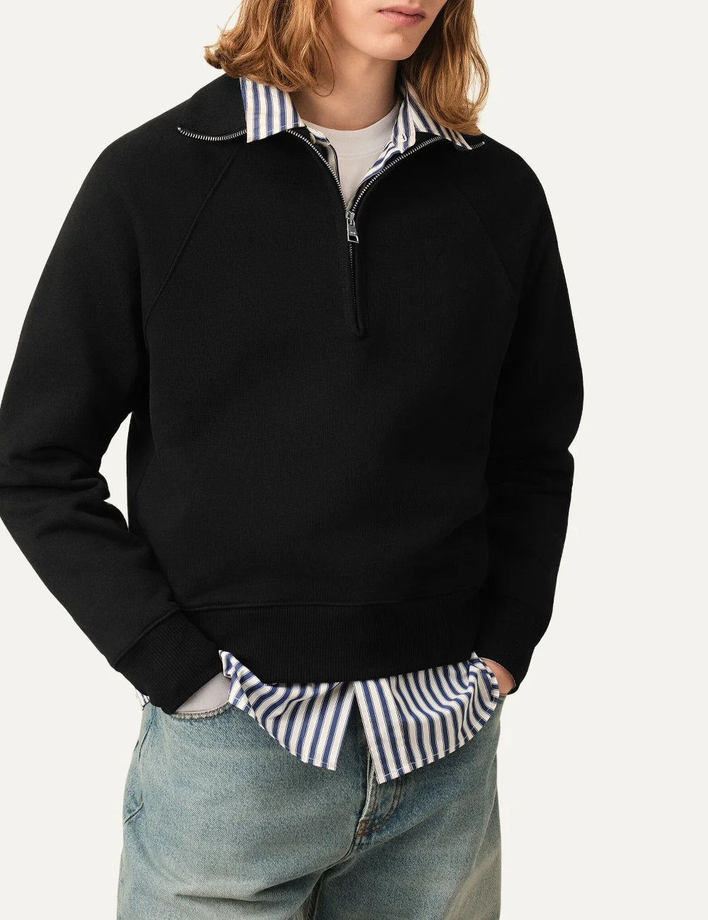 AMI Paris men black organic cotton half-zip sweatshirt with tonal Ami de Coeur logo model