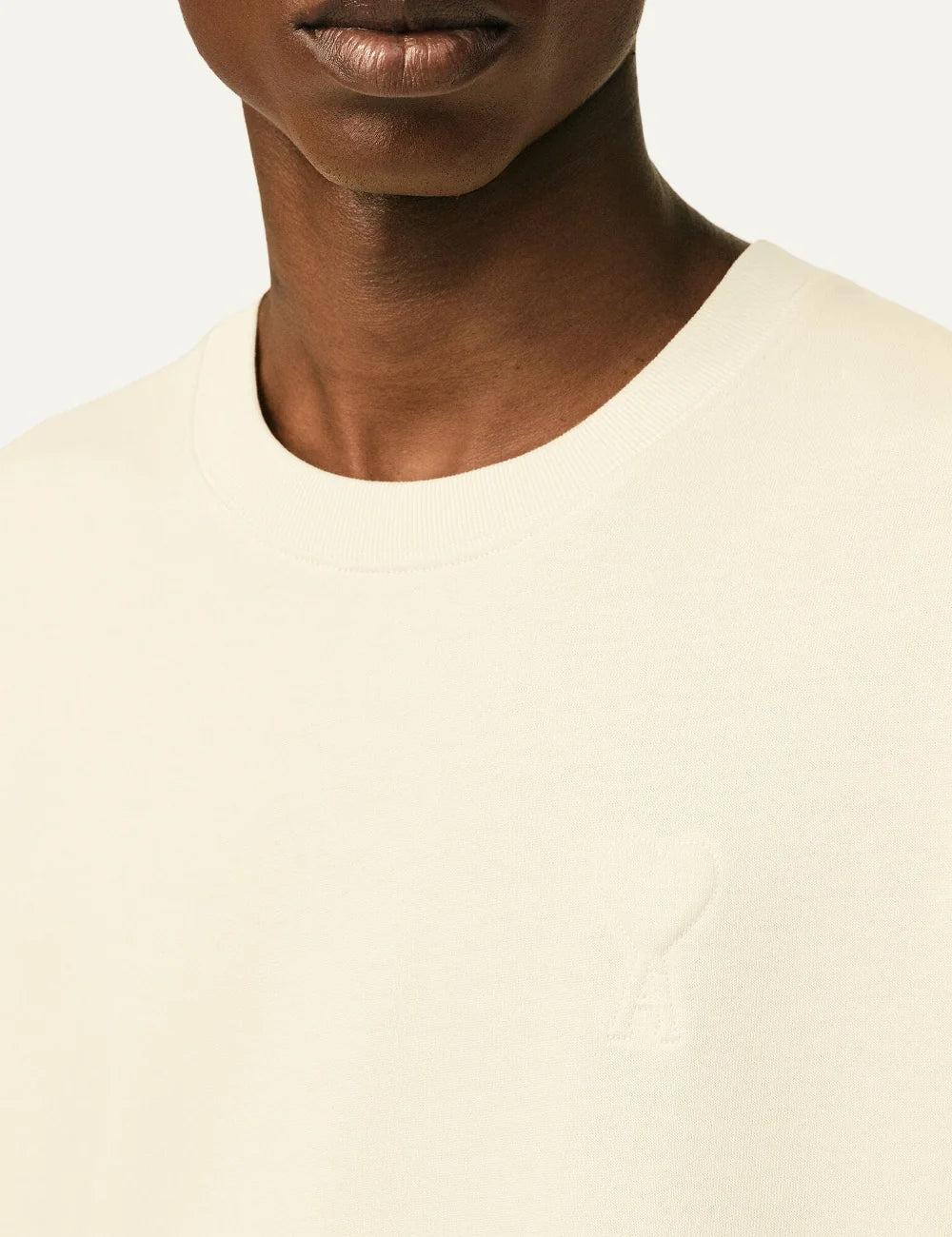 AMI Paris men ecru organic cotton T-shirt with tonal Ami de Coeur logo detail