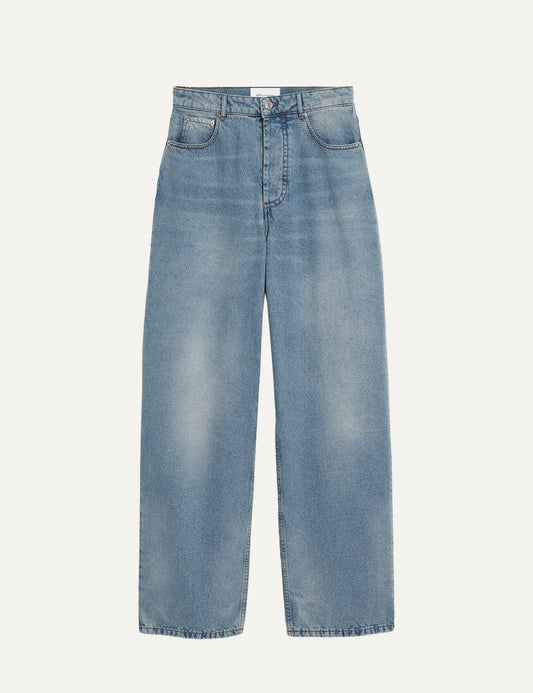 Ami Paris men's light blue washed baggy jeans with wide legs, five pockets, silver metal hardware and contrast tobacco stitching.