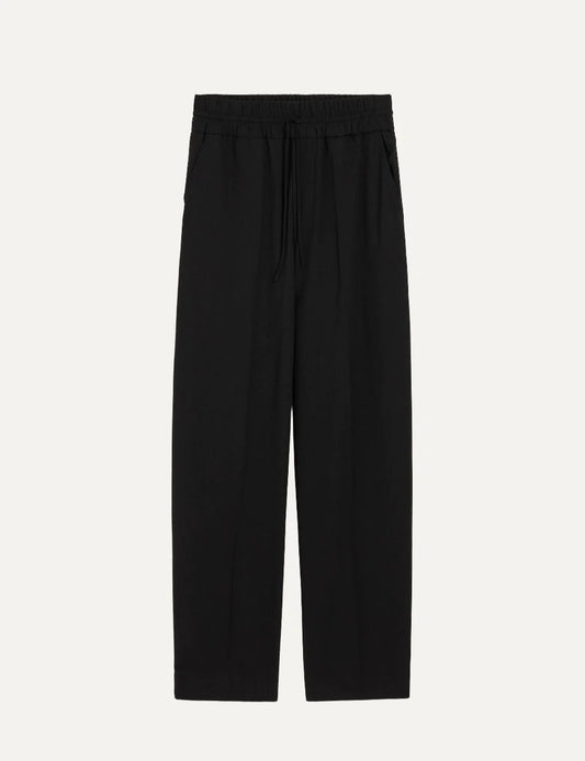 Ami Paris unisex black relaxed-fit trousers with an elasticated drawstring waist, side pockets and straight legs.