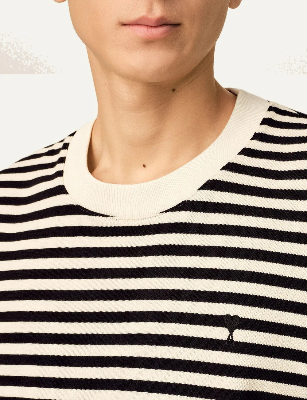 Ami Paris unisex cream and black striped long sleeve cotton T-shirt with a crew neck and black Ami de Coeur chest embroidery detail