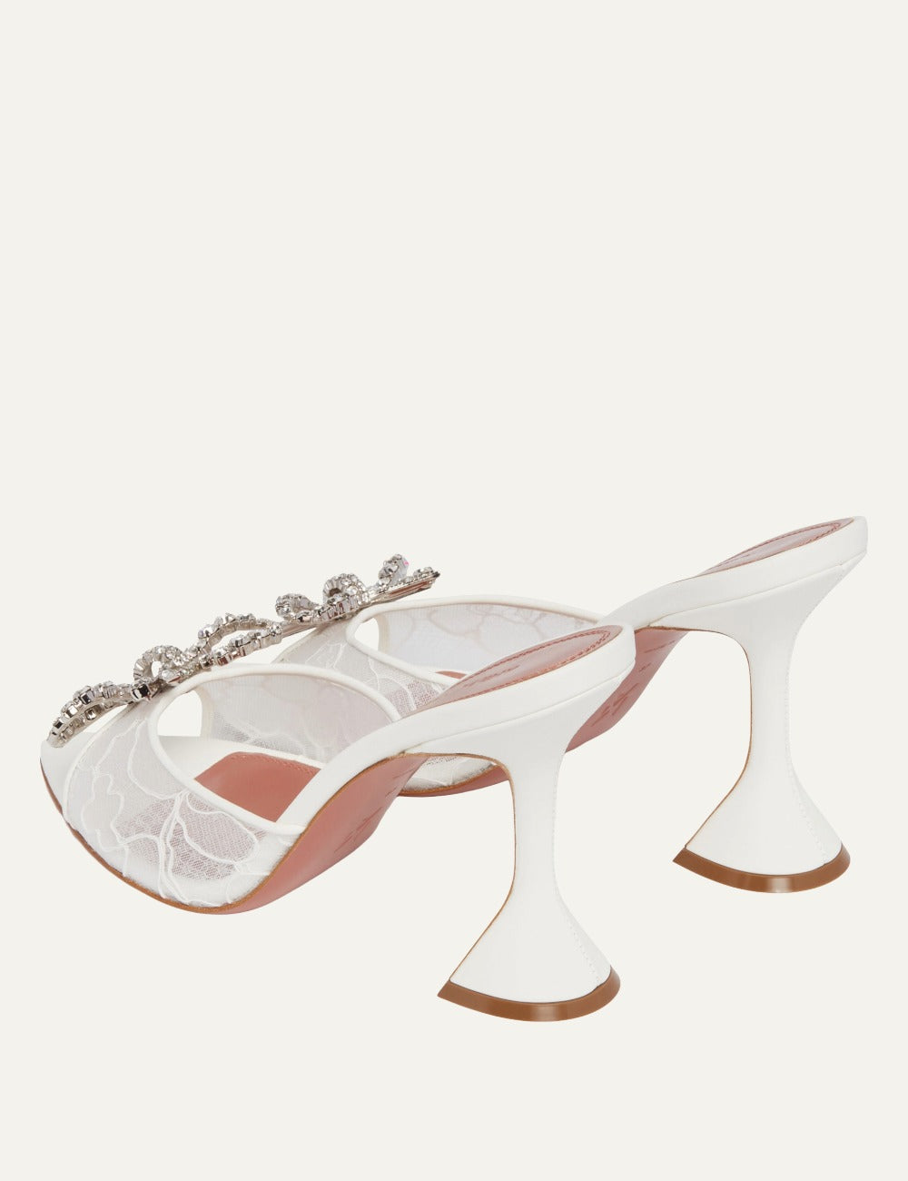 Amina Muaddi Rosie lace slippers white hourglass heel back angle