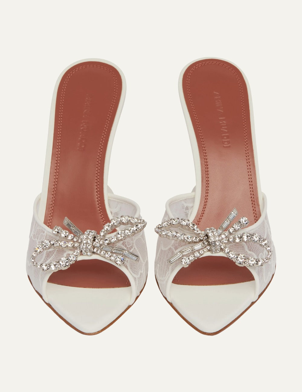 Amina Muaddi Rosie pointed toe mules white front view