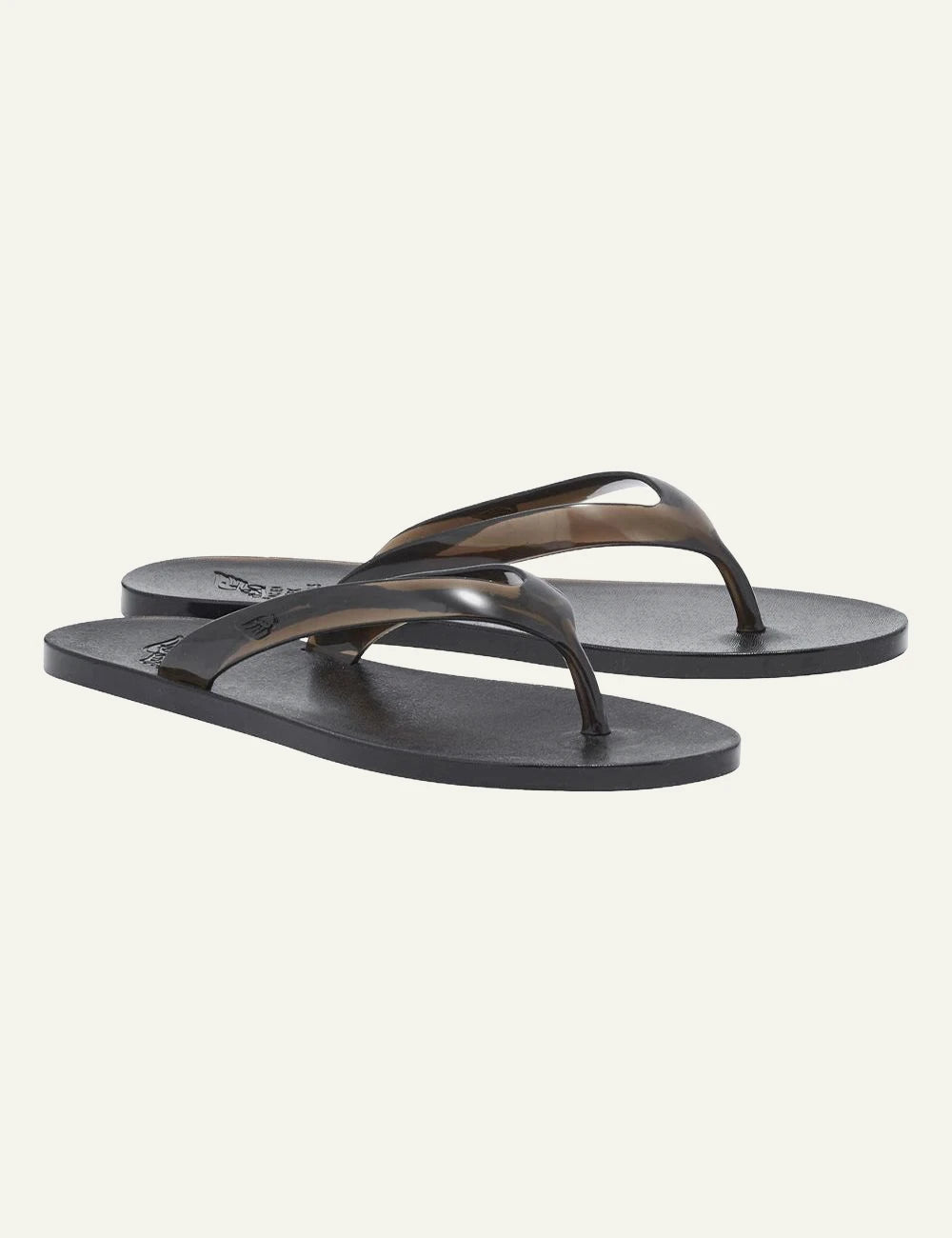 Ancient Greek Sandals jelly flip flop black minimal thong sandal profile view