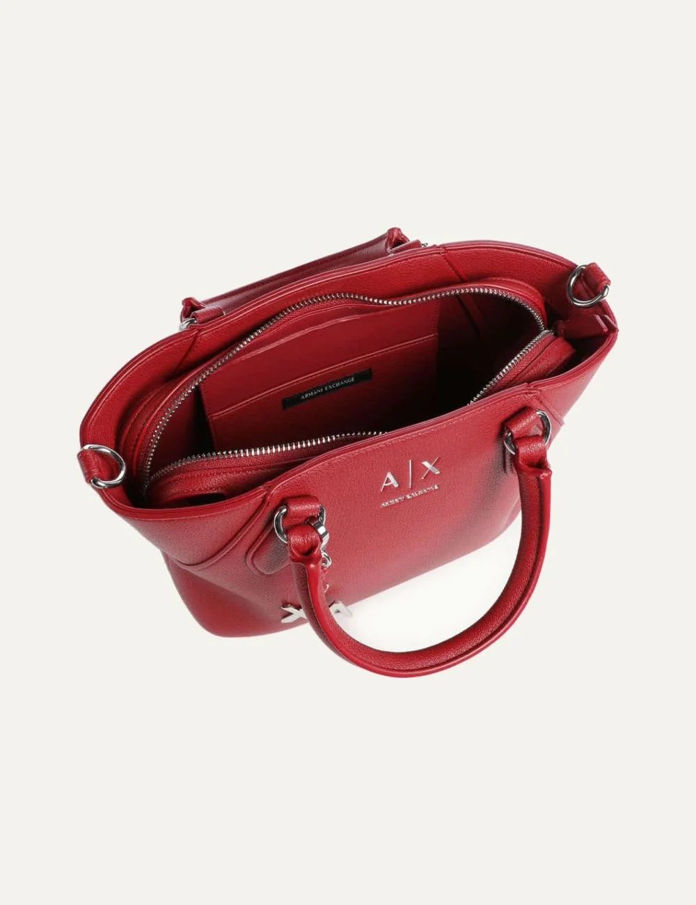Women's Armani Exchange burgundy handbag with double top handles, detachable adjustable shoulder strap, silver-tone A|X logo charm and zip closure top