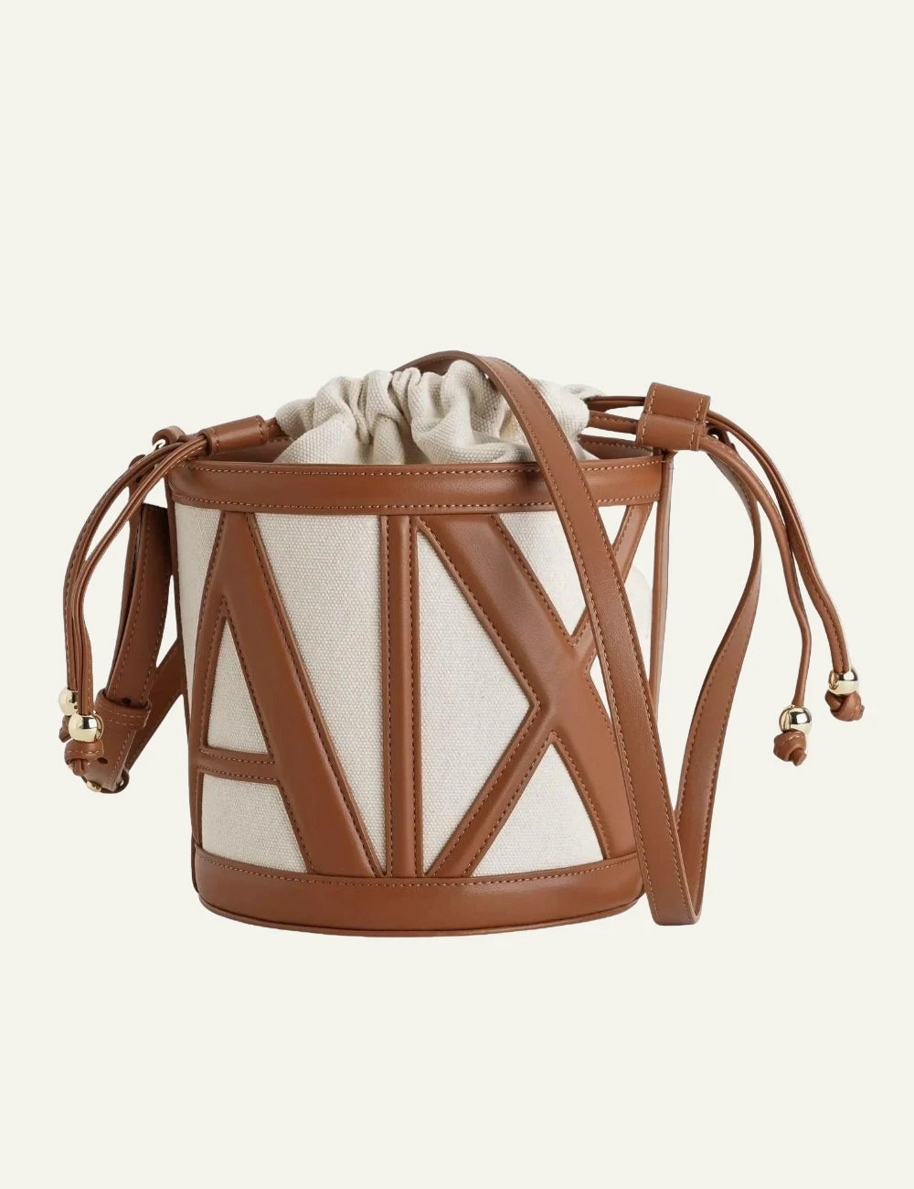 armani exchange canvas bucket bag beige and brown front view