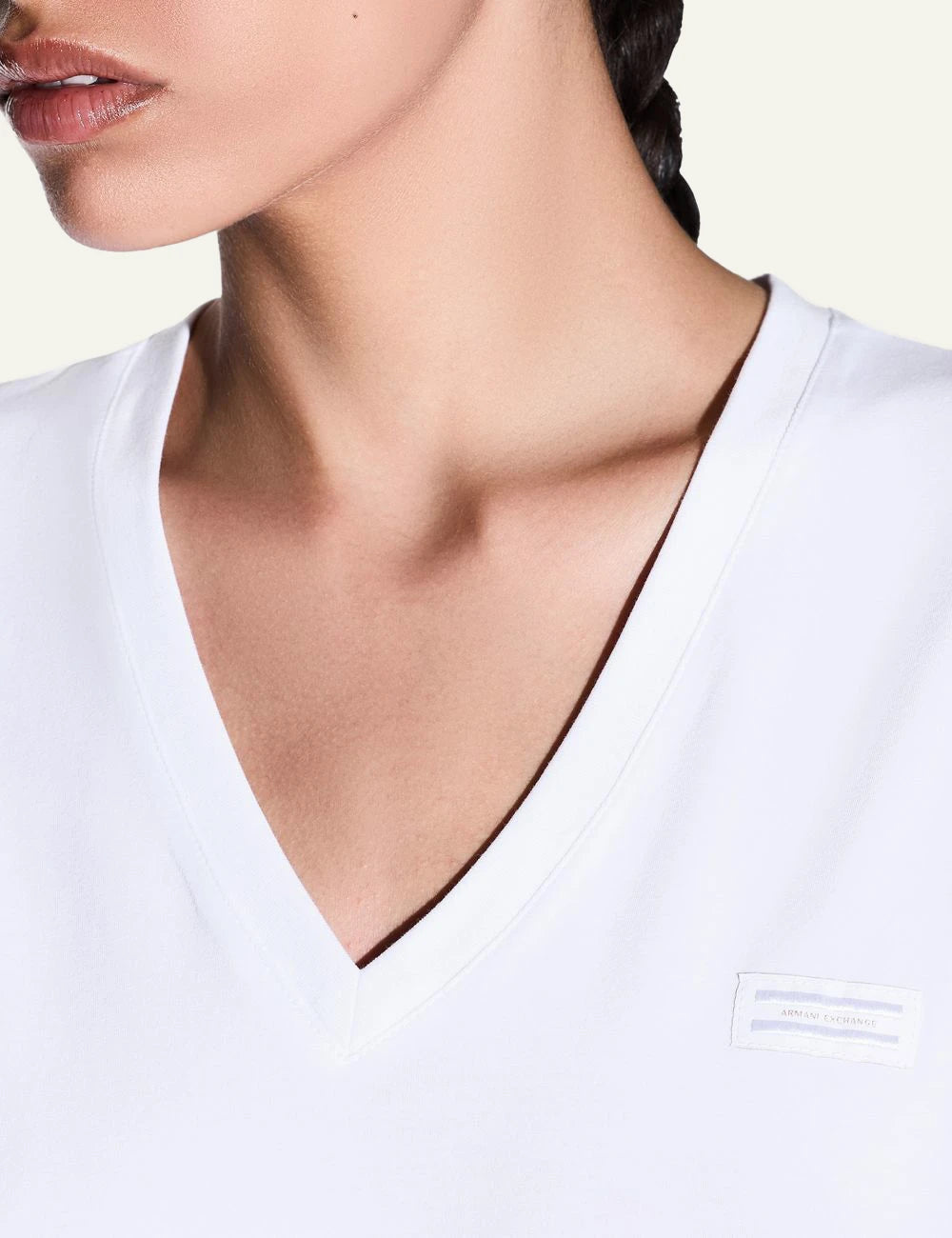 Armani Exchange white v-neck t-shirt minimal logo front detail view