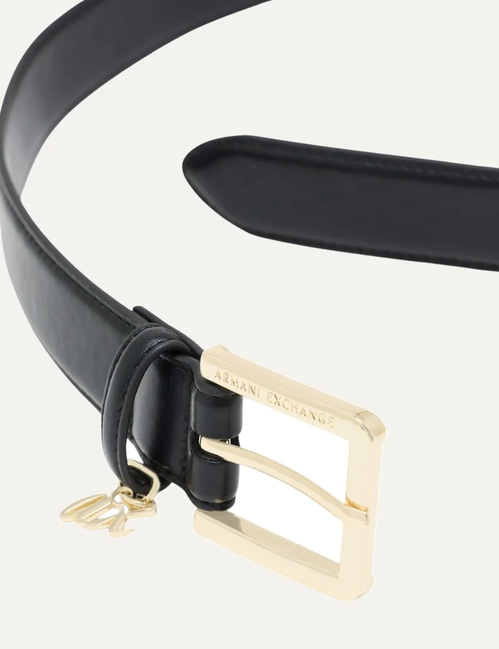 Women's Armani Exchange black belt with gold-tone metal buckle, engraved branding and A|X logo charm angled