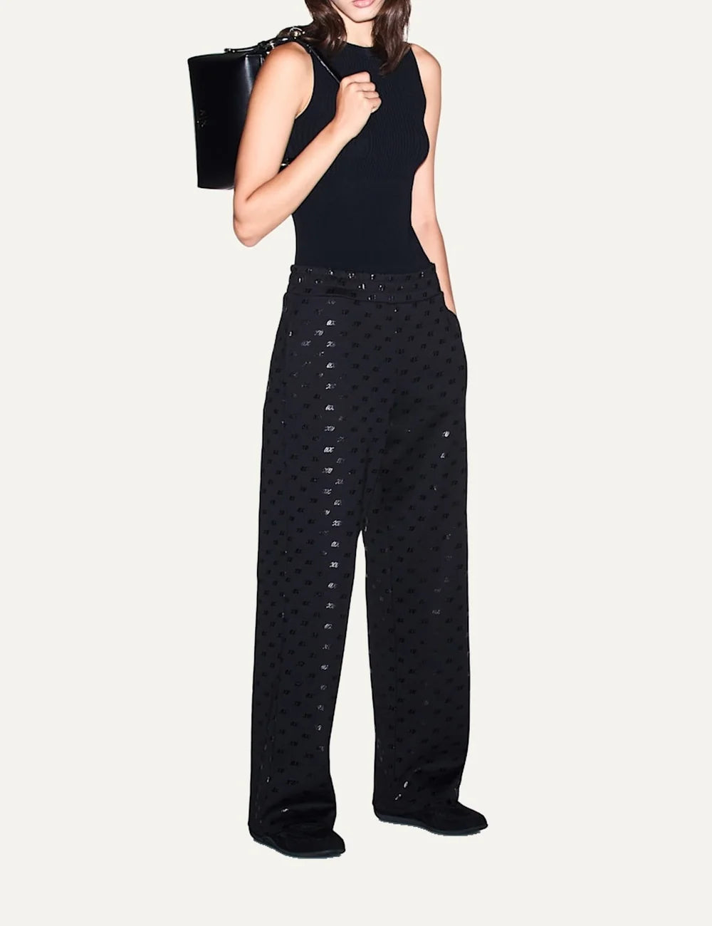 Armani Exchange women's black wide-leg cotton sweatpants with all-over tonal A|X logo print and elasticated waistband full body