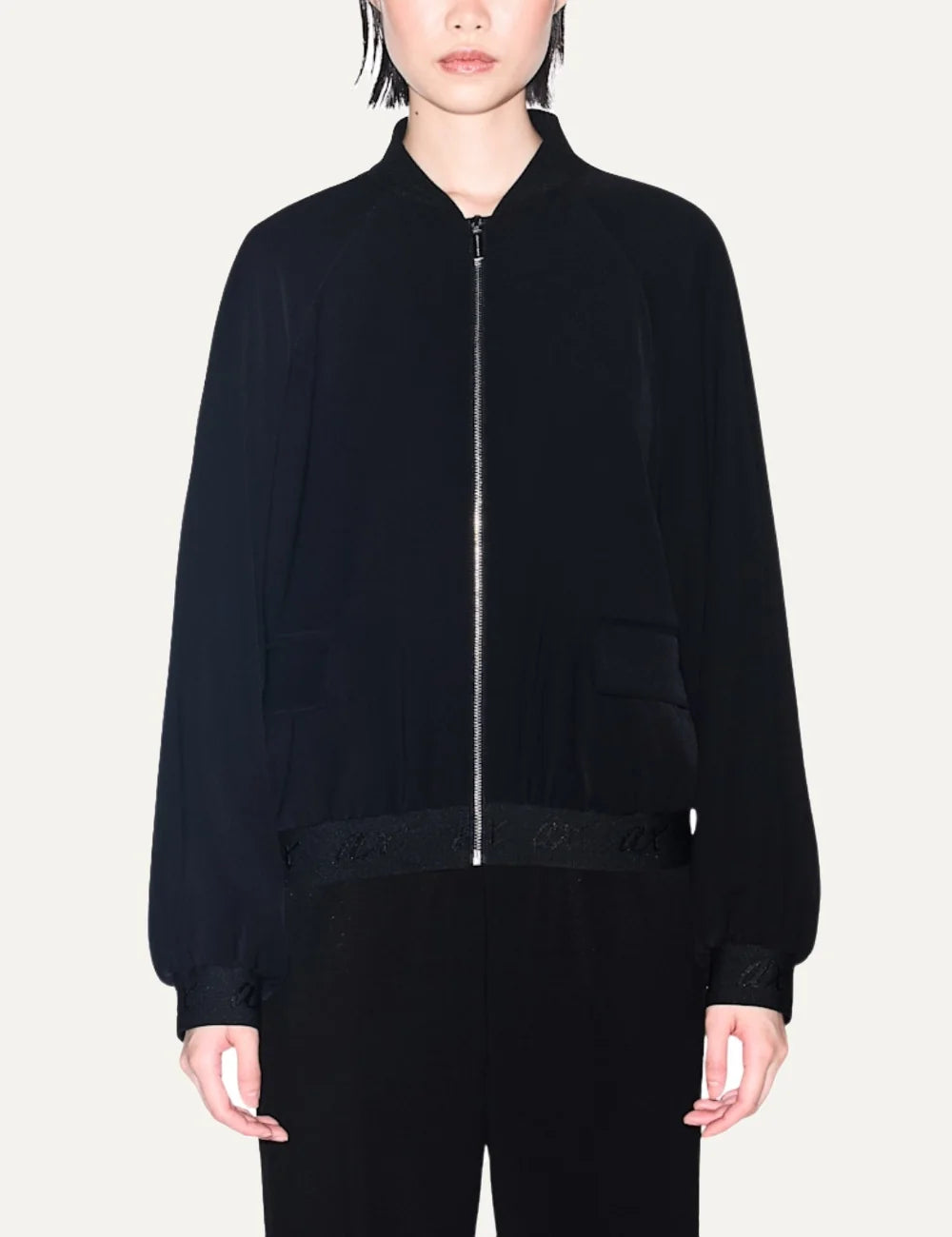 Women's Armani Exchange black polyester bomber jacket with zip closure, flap pockets and tonal logo elastic trims model