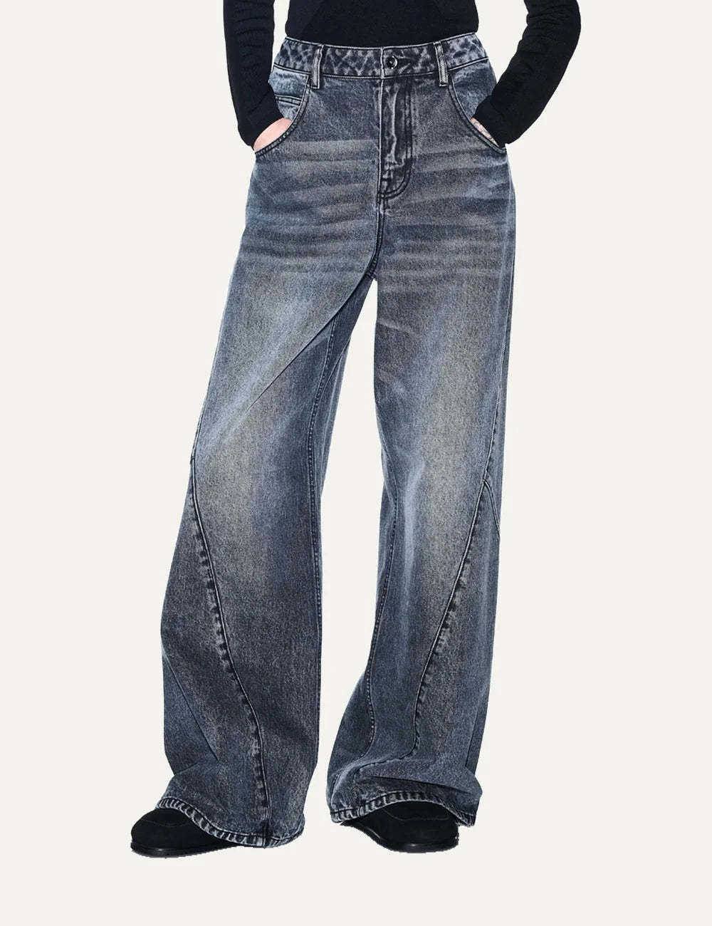 Women's Armani Exchange blue washed denim jeans with low waist, oversized fit, wide legs and panel seam details model