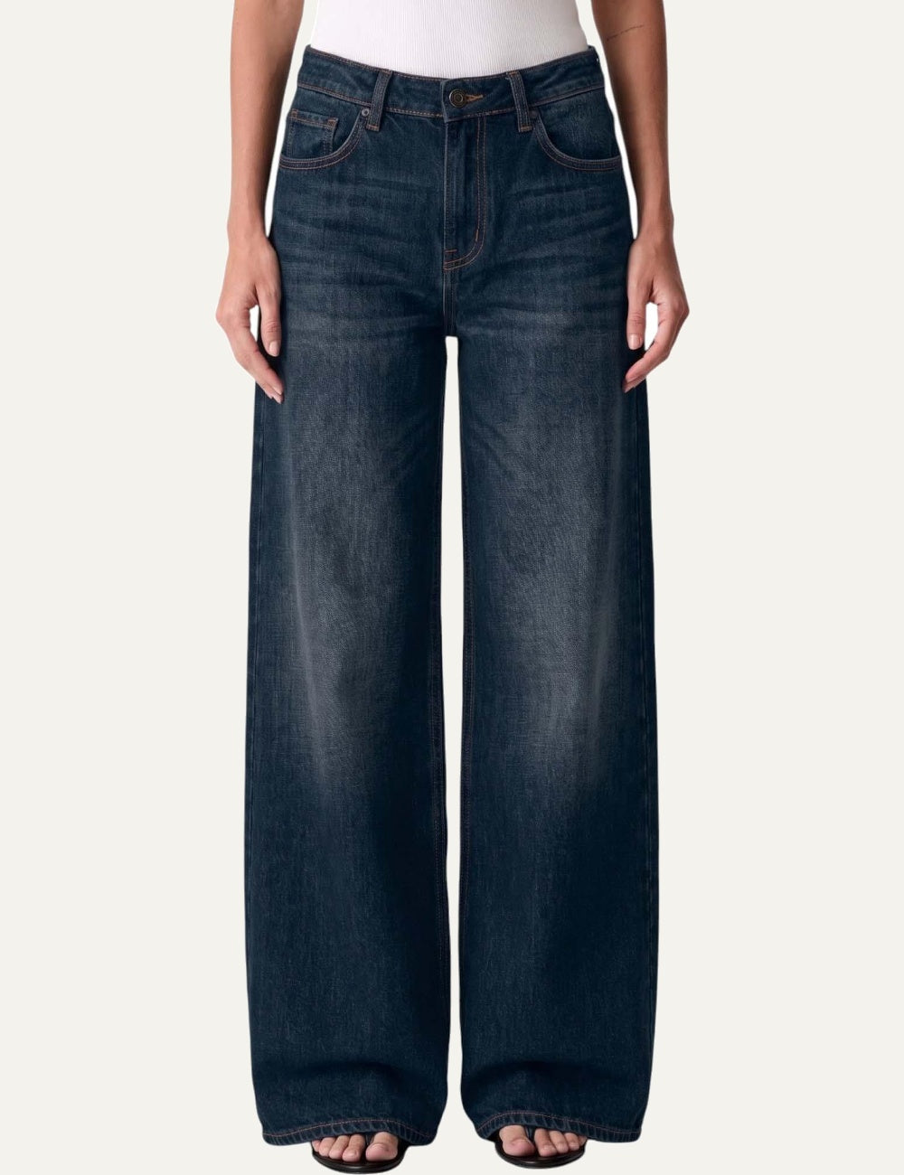 Armani Exchange women's dark blue cotton jeans with low waist, wide legs, classic five-pocket design and subtle faded effect model
