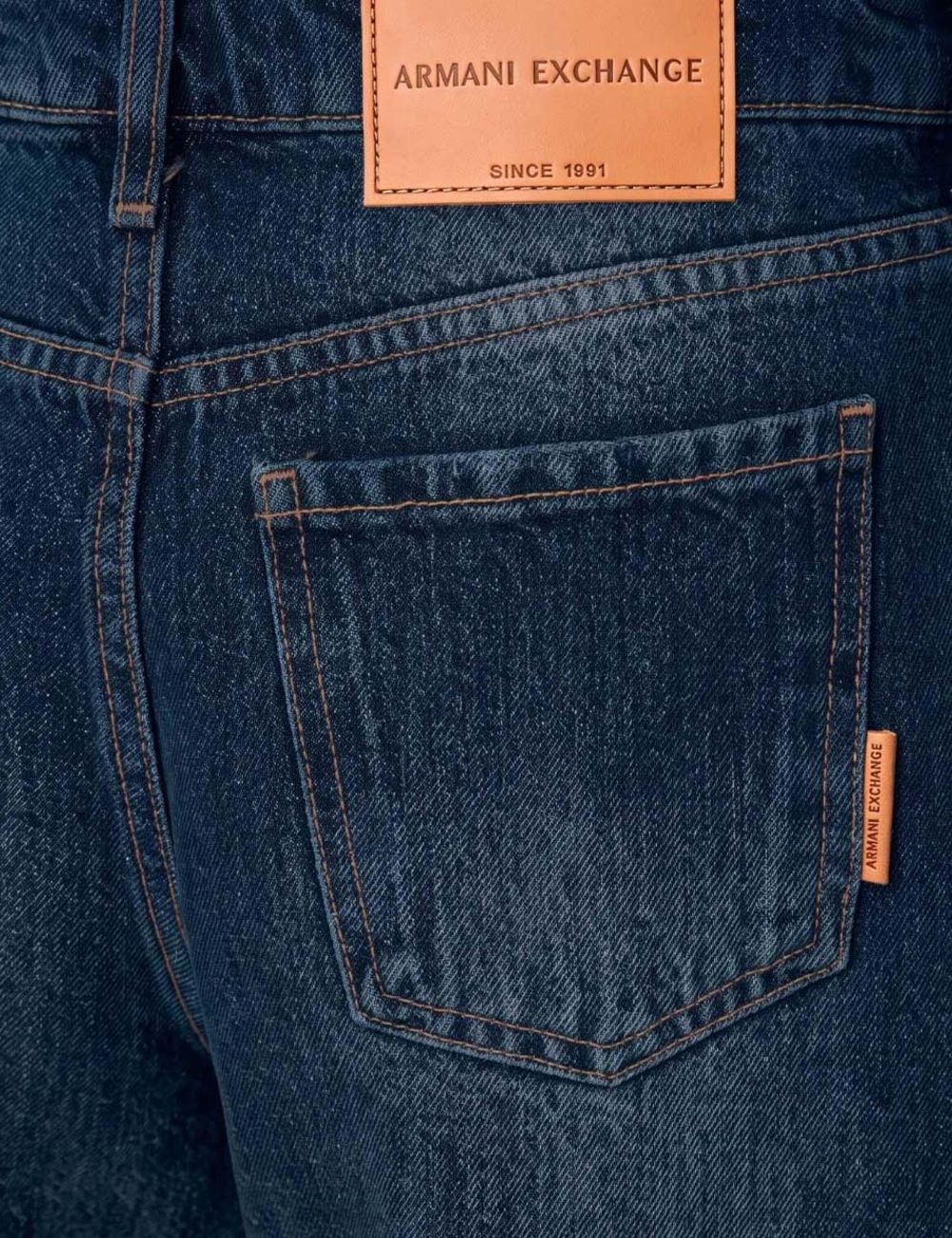 Armani Exchange women's dark blue cotton jeans with low waist, wide legs, classic five-pocket design and subtle faded effect back detail