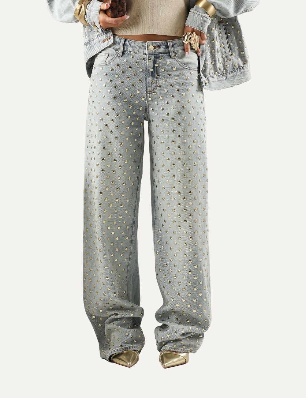Armani Exchange women's light blue wide-leg jeans with allover metallic studs and rhinestone embellishments model