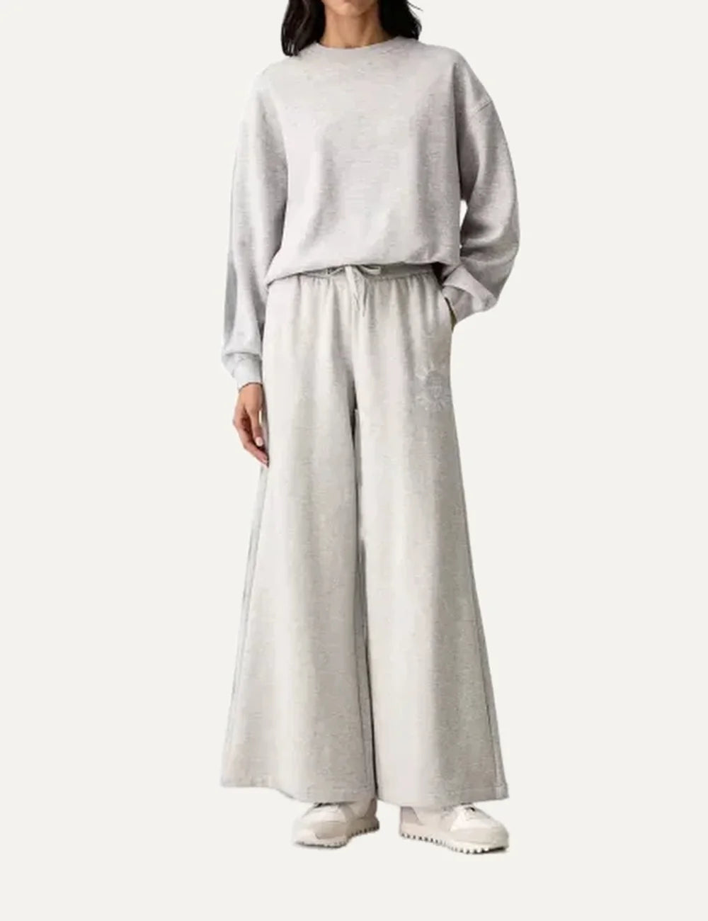 Armani Exchange women's light grey melange wide-leg sweatpants with elastic drawstring waist, side pockets and tonal logo full body