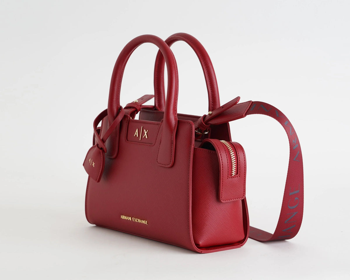 Armani Exchange women's red faux leather handbag with double top handles, detachable shoulder strap and gold-tone AX logo side