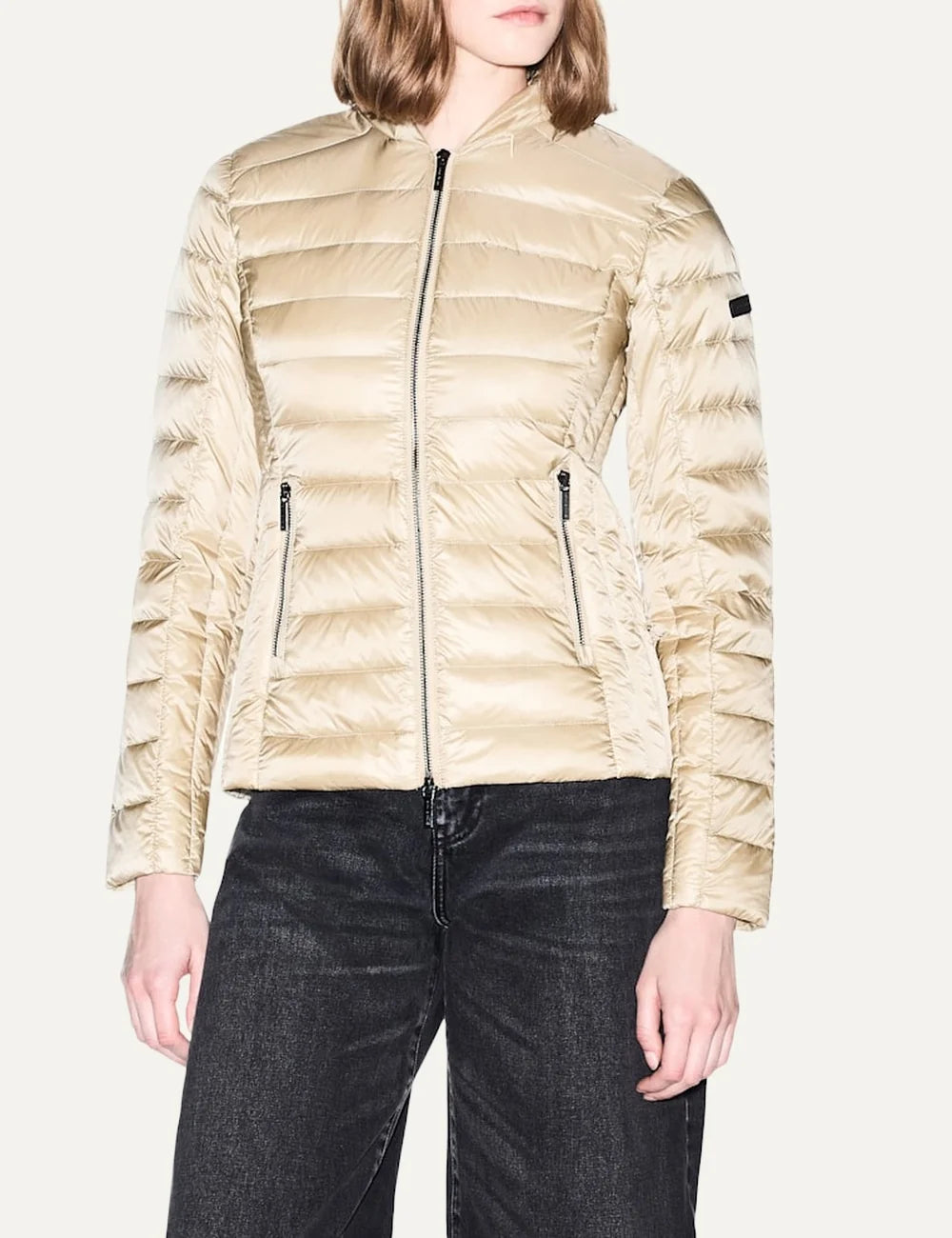 Women's Armani Exchange beige quilted down jacket with high collar, front zip closure and zippered side pockets model