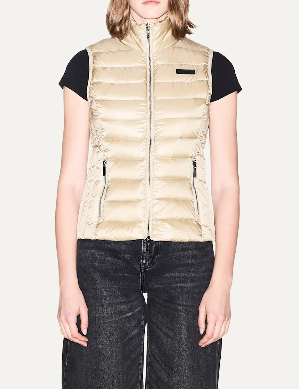 Women's Armani Exchange beige quilted down vest with high collar, front zip closure and zippered side pockets model
