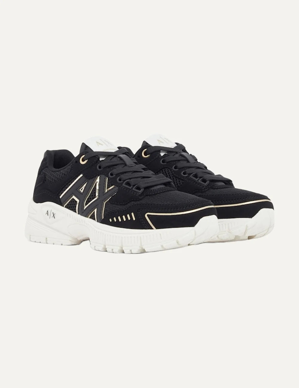 Women's Armani Exchange black multi-material sneakers with mesh panels, metallic A|X logo, reflective details and chunky white rubber sole front