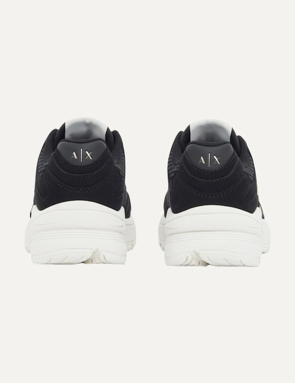 Women's Armani Exchange black multi-material sneakers with mesh panels, metallic A|X logo, reflective details and chunky white rubber sole back