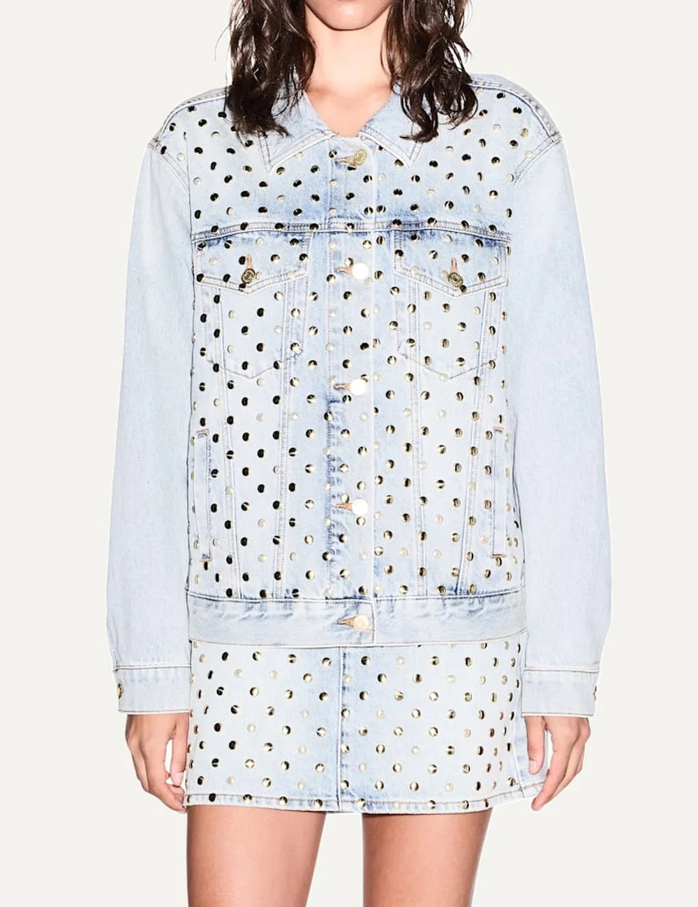 Women's Armani Exchange light blue rigid denim jacket with all-over metal studs, pointed collar, button closure and flap pockets model