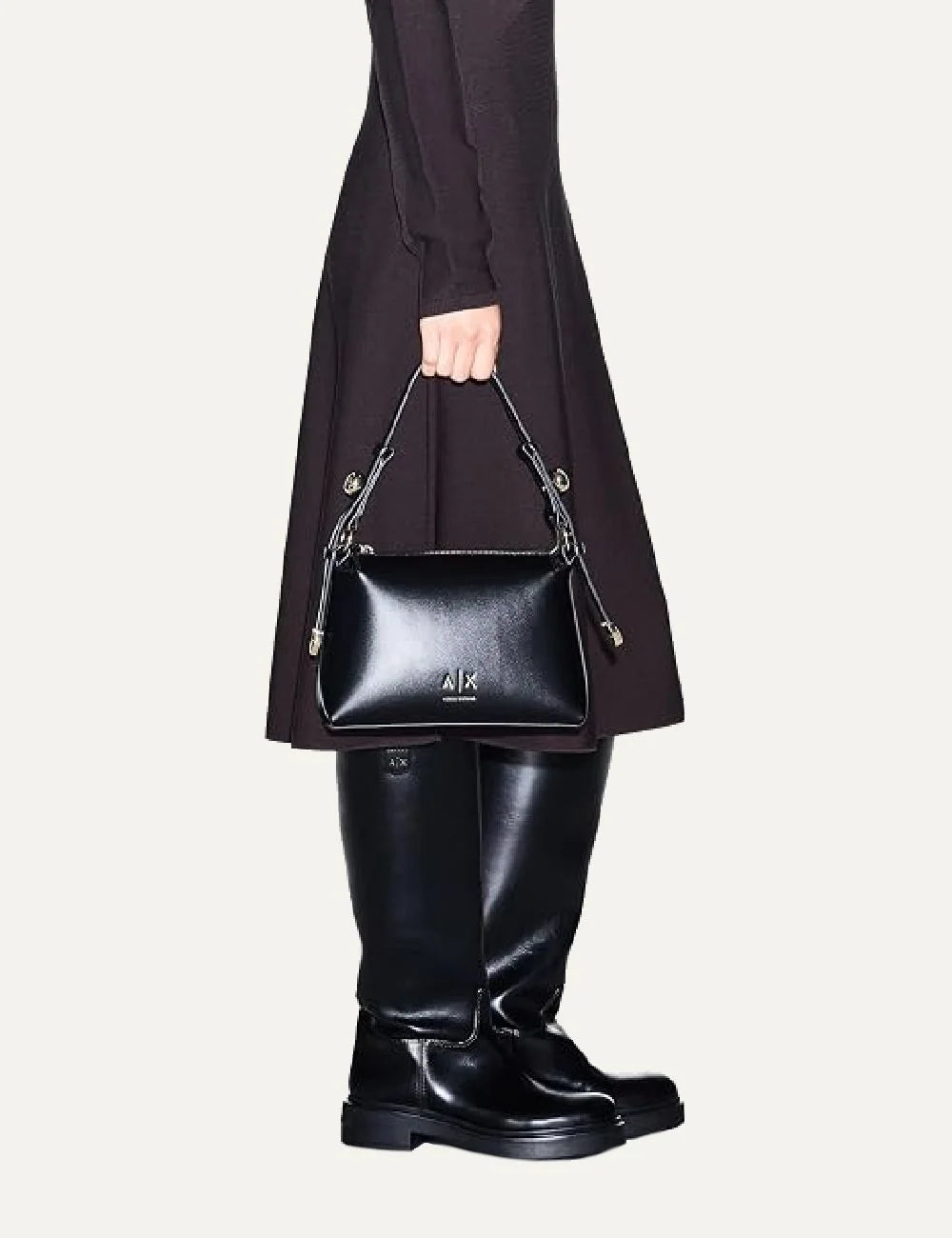 Women's Armani Exchange black shoulder bag with zip closure, slim strap, gold-tone hardware and A|X logo model