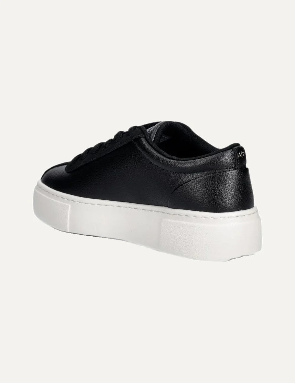 Women's Armani Exchange black sneakers with pebbled polyurethane upper, suede details, side logo lettering, lace-up closure and chunky white rubber sole back