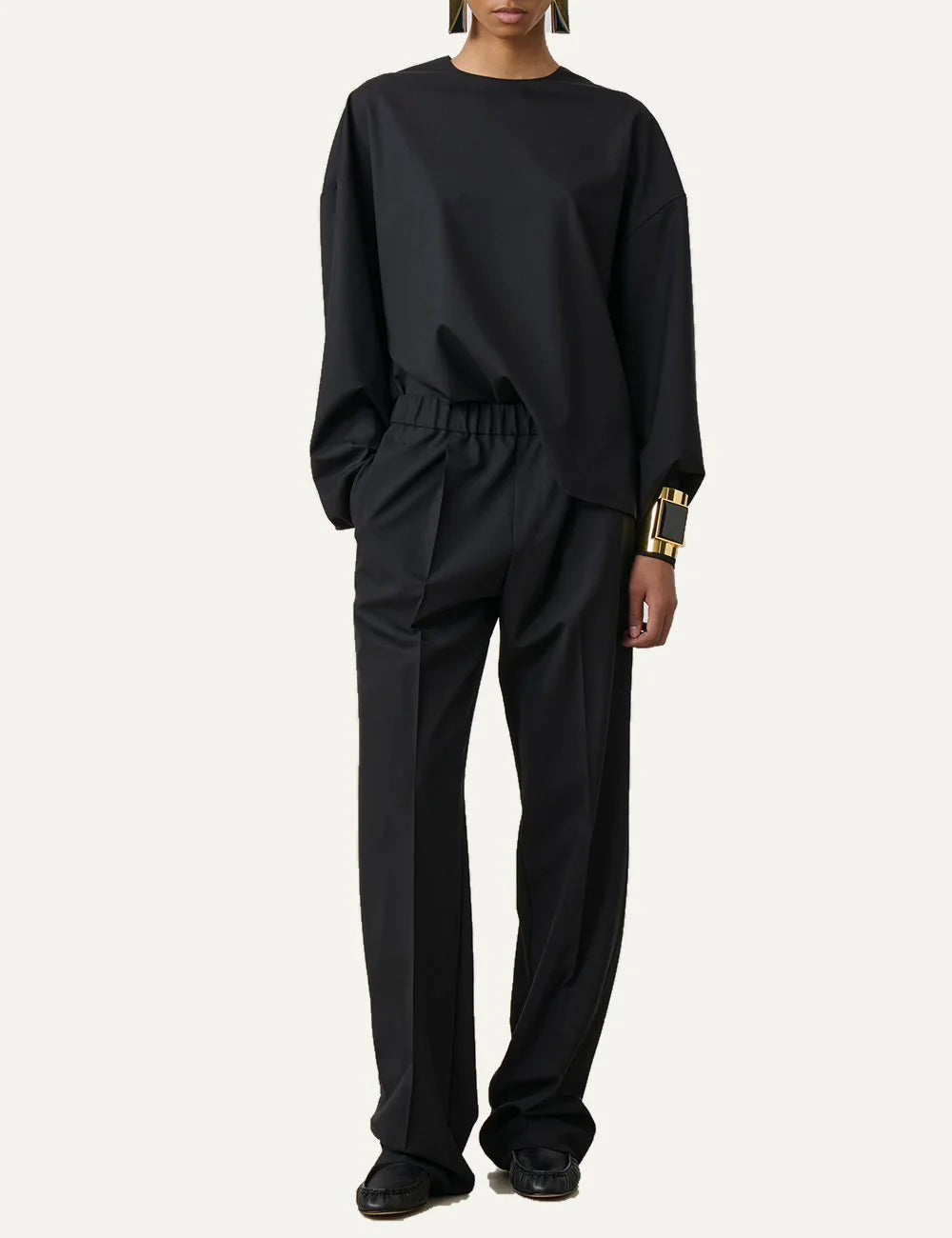 Armarium black relaxed fit wool trousers with elasticated waistband, front pleats and wide straight legs full body