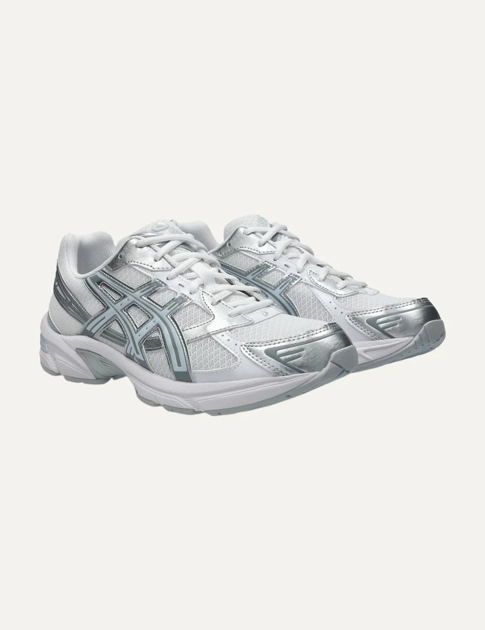 ASICS GEL-1130 women's white and silver sneakers with mesh and metallic details angled
