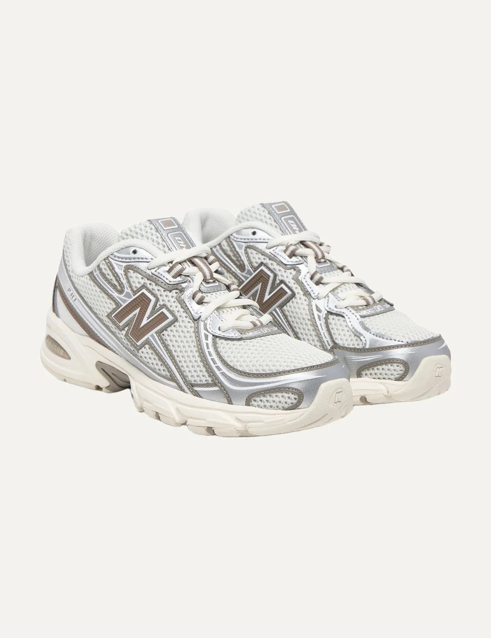 New Balance unisex cream grey mesh sneakers angled