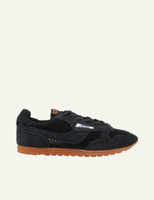 Autry low sneaker black suede mesh brown sole side view