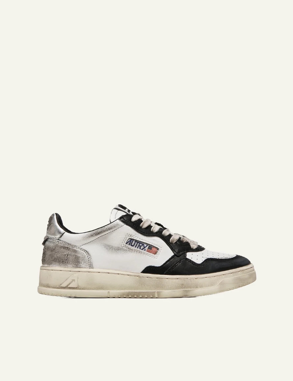 Autry low sneaker white black leather silver heel side view