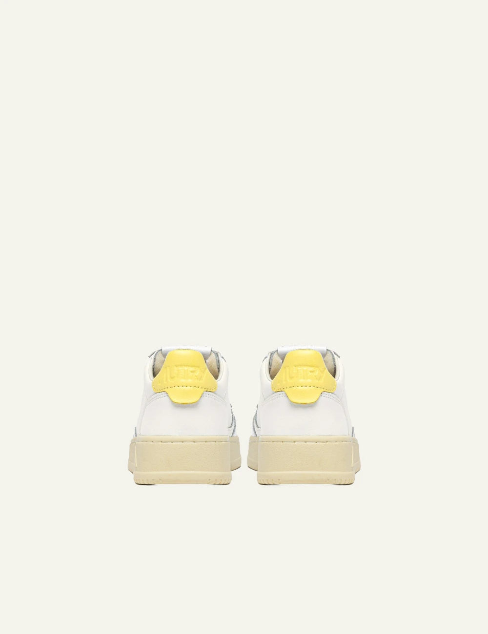 Autry Medalist low sneaker white leather lemon yellow heel detail back pair view