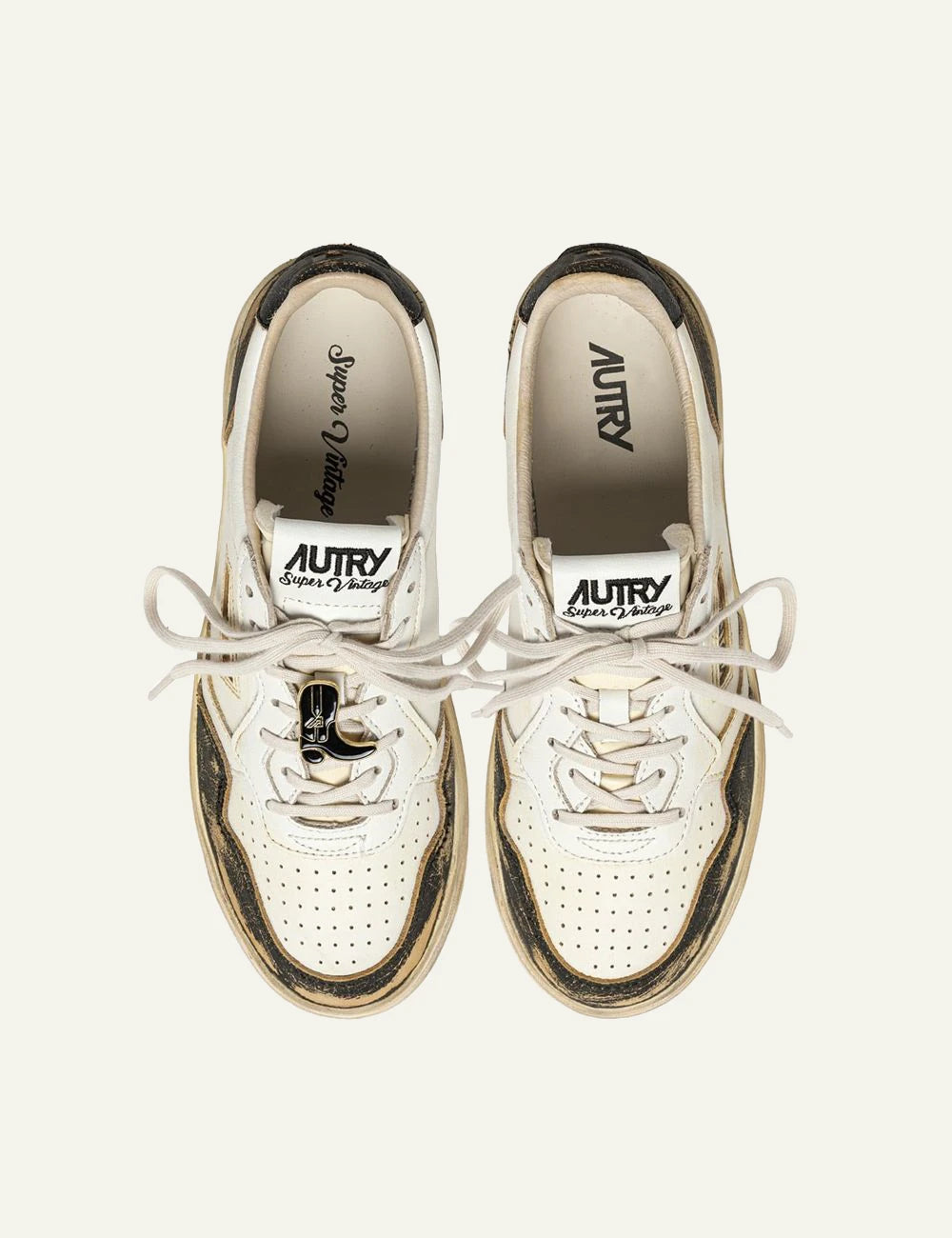 Autry men’s white and black leather sneakers with distressed vintage finish top