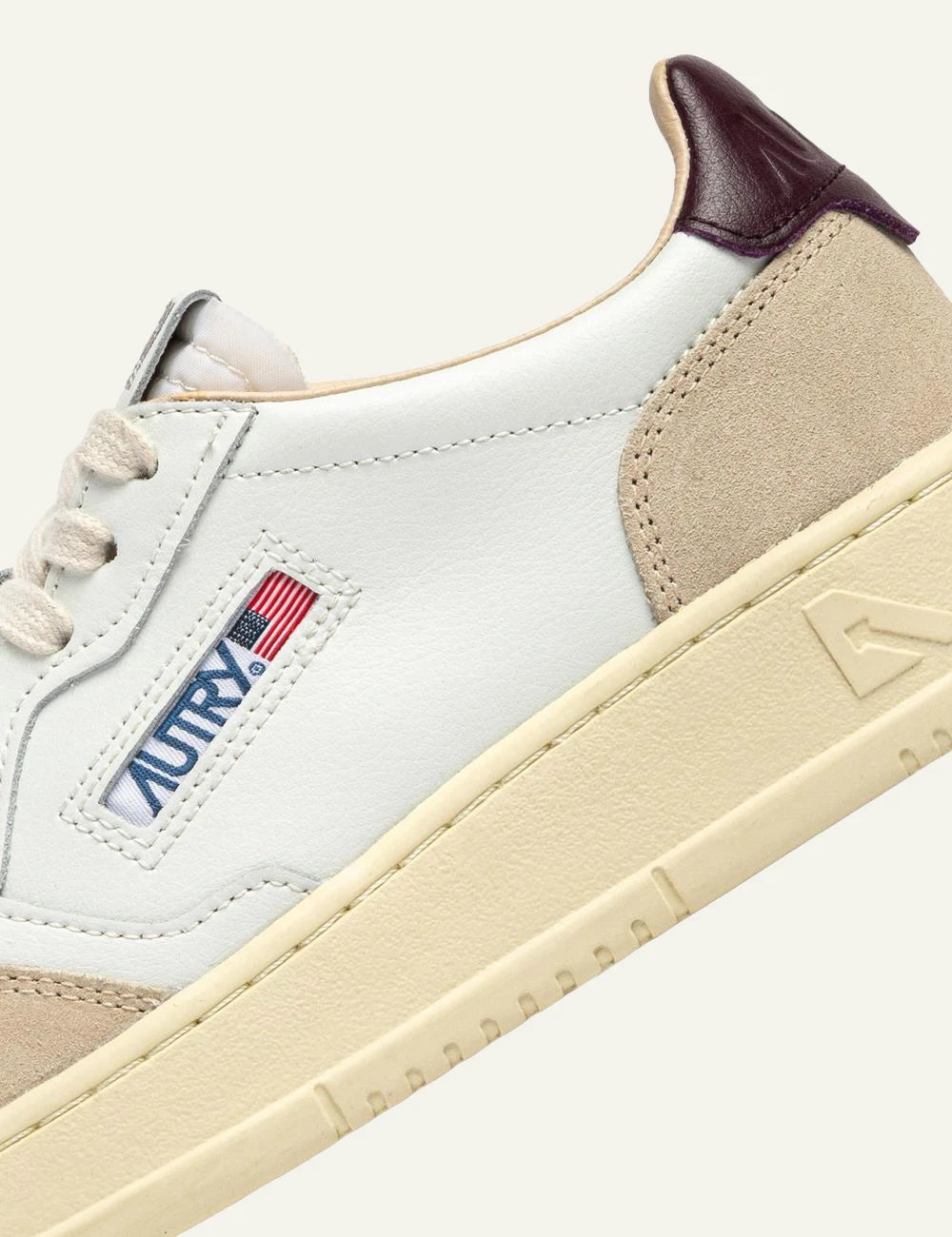 Autry women’s white leather sneakers with beige suede and burgundy details logo
