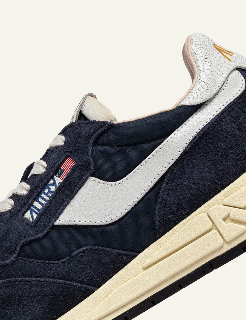 Autry Reelwind low sneaker navy blue suede nylon side angle