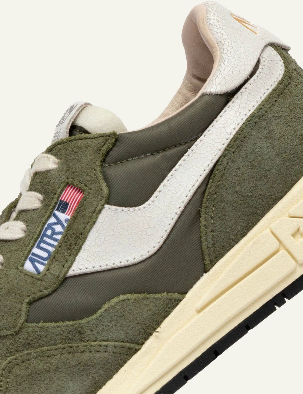 Autry Reelwind low sneaker olive green suede nylon side angle