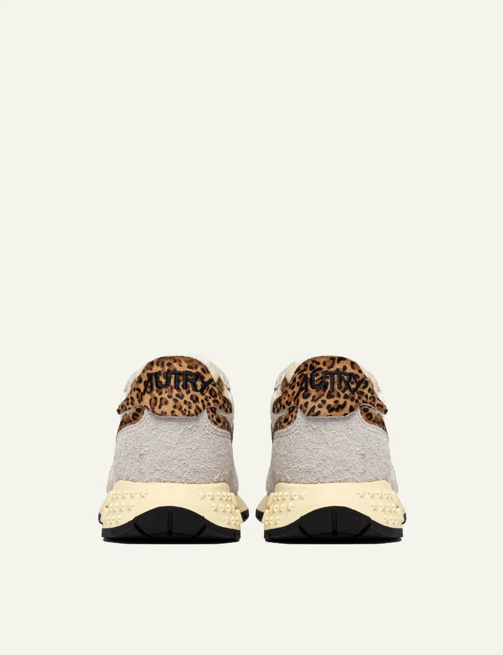 Autry women’s Reelwind Low white suede and mesh sneakers with leopard-print details back view