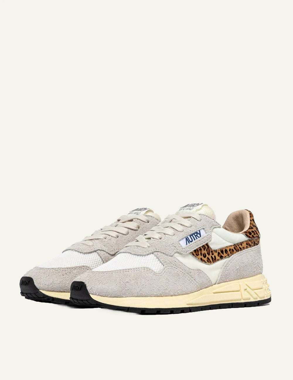 Autry women’s Reelwind Low white suede and mesh sneakers with leopard-print details pair side view