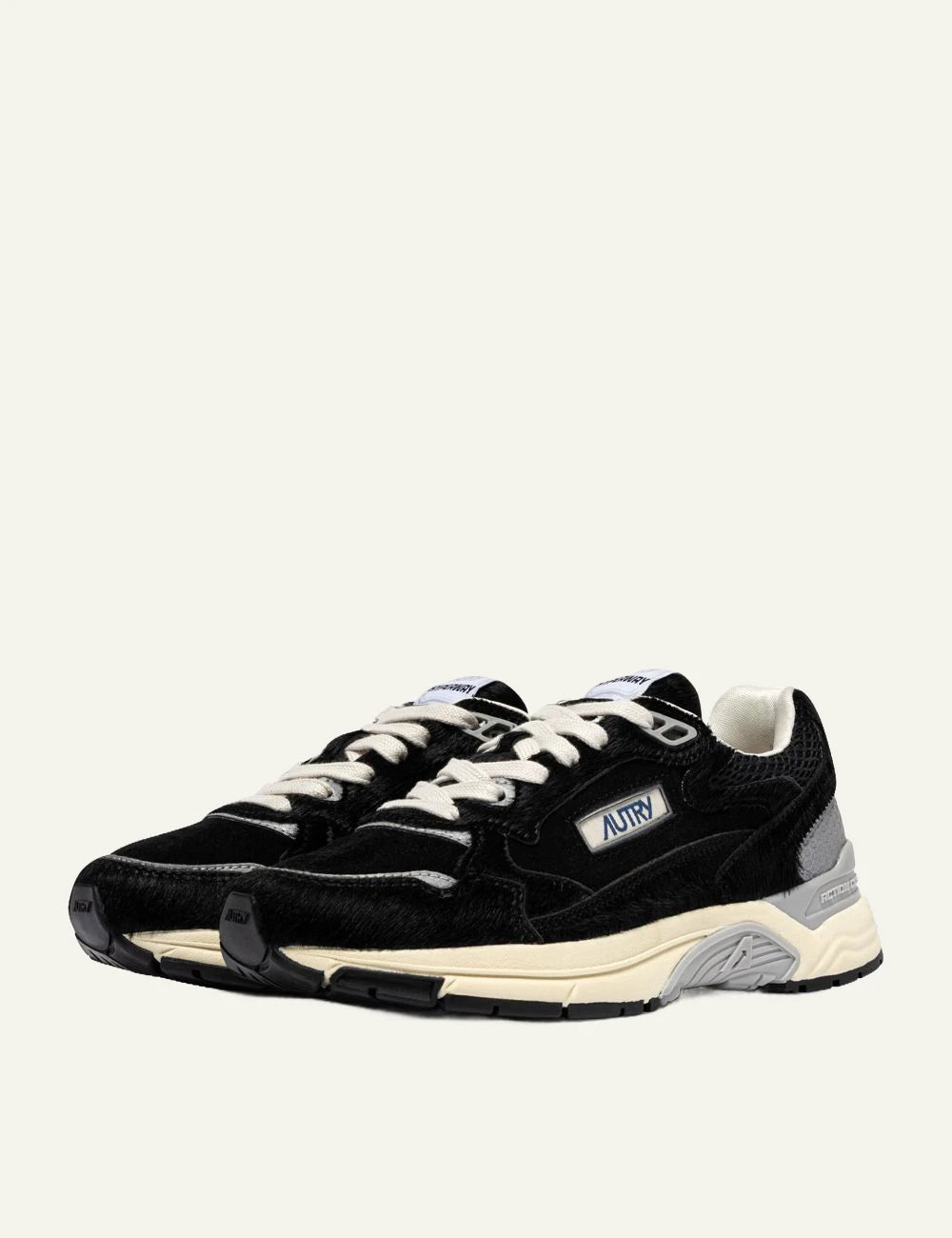 Autry women's black Hyperway pony effect suede and mesh sneakers profile