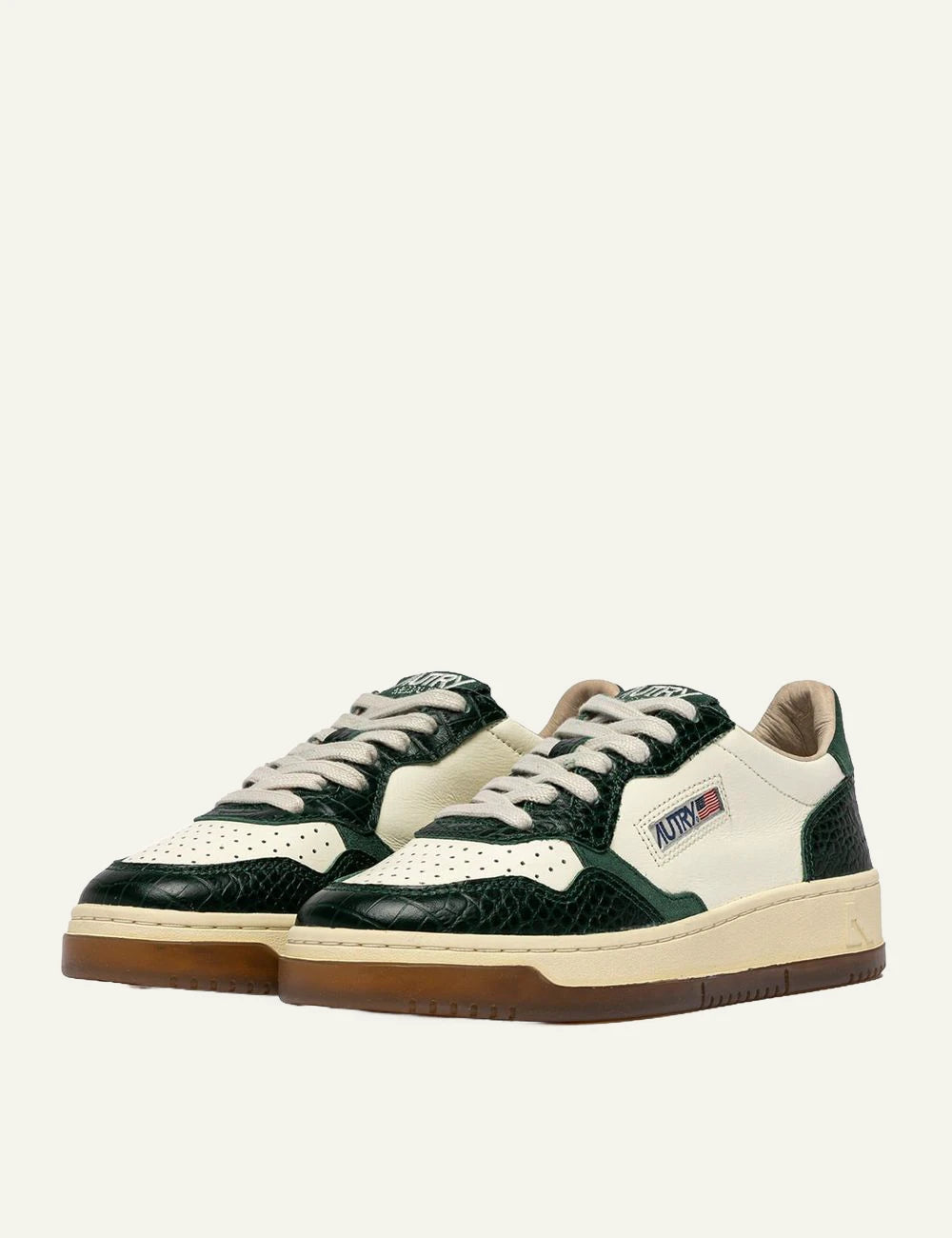 Autry women’s ivory leather sneakers with green crocodile-effect details profile